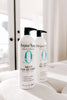 Two bottles of Original Spry Originals Classic Collection shampoo and conditioner on a white surface.